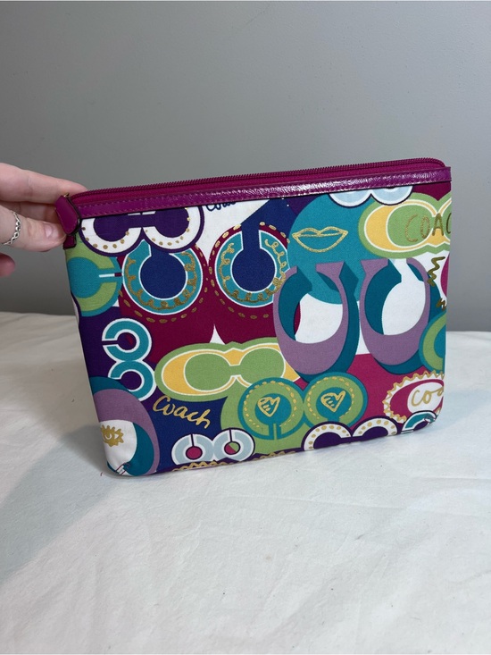 Coach Handbags - Coach Poppy tablet case featuring a vibrant multicolored graffiti "C" print